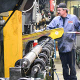 Rumpke Mechanic Working On Machinery Maintenance Career