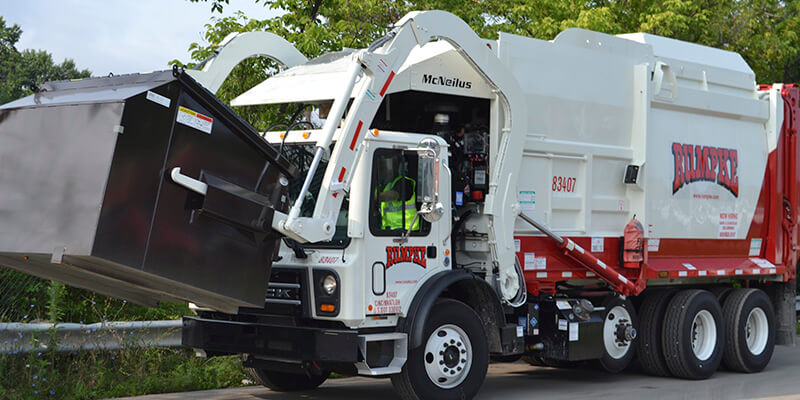 Rumpke Truck Lifting Dumpster For Tourism Waste Recycling Services