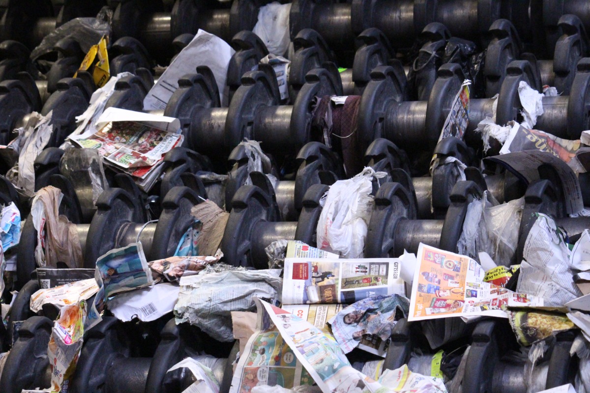 Plastic Bags And A Tie Tangled In Rumpke Recycling Equipment