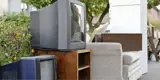 Bookshelf Couch And Two Televisions Outside For Rumpke Bulk Trash Removal
