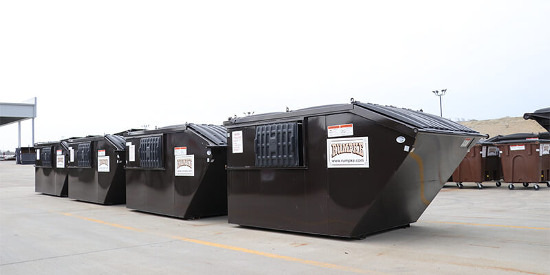 Four Rumpke Front Load Dumpsters 1
