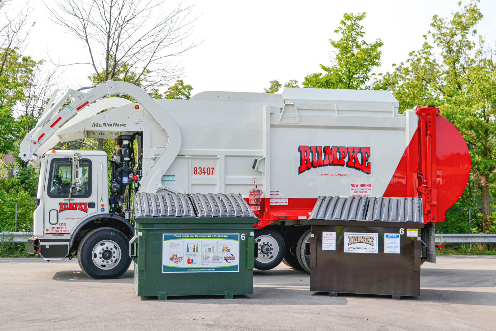 Rumpke Truck And Two Dumpsters For Commercial Waste Pickup