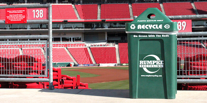 Green Rumpke Recycling Container Inside Sports Facility