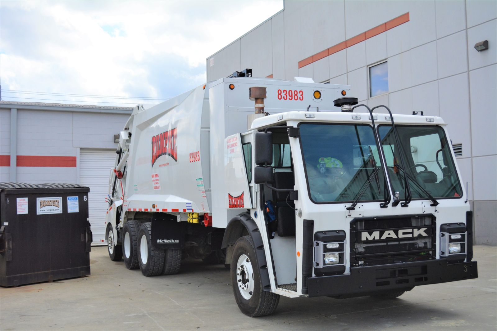 Rumpke Truck And Dumpster For Commercial Trash Pickup Services