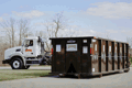 Rumpke Roll Off Dumpster In Front Of Rumpke Roll Off Truck